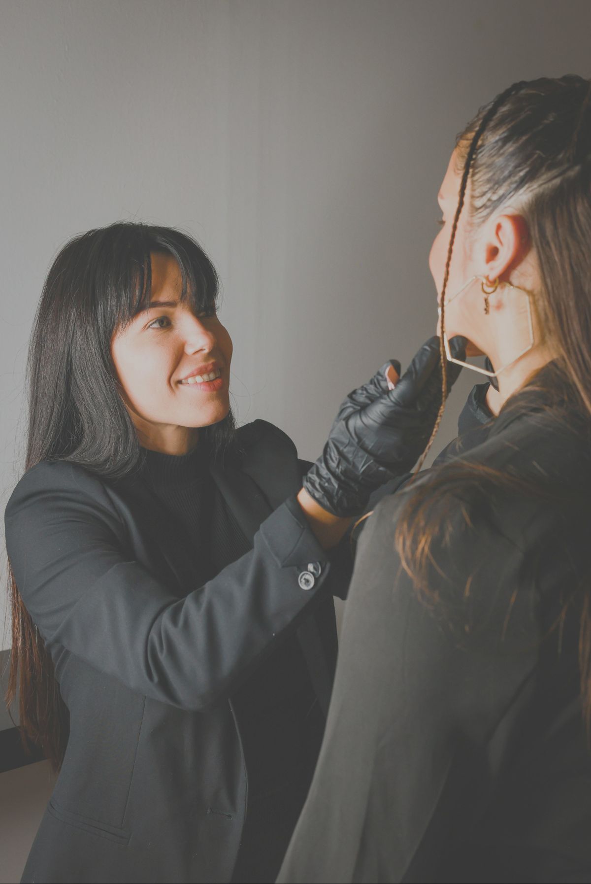 Stylist working on a client's hair
