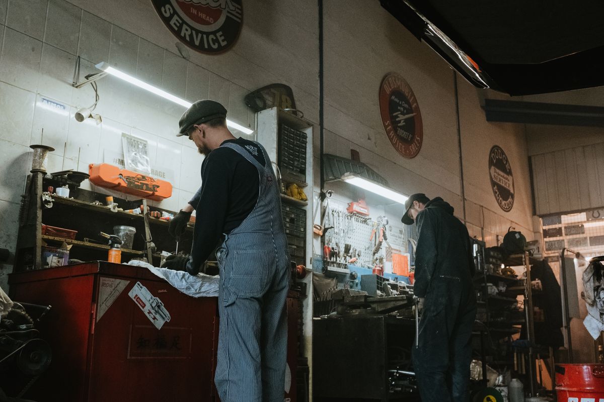 Two mechanics working in the shop